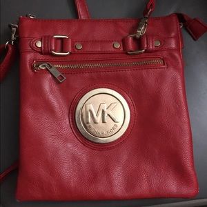 MK side purse👛